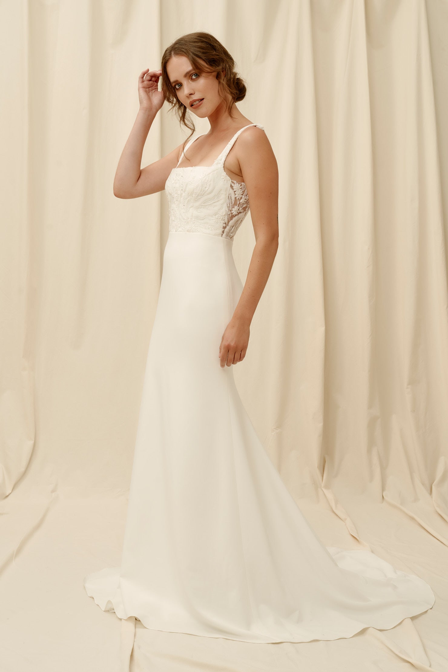 Fitted crepe wedding dress with low back and square neck