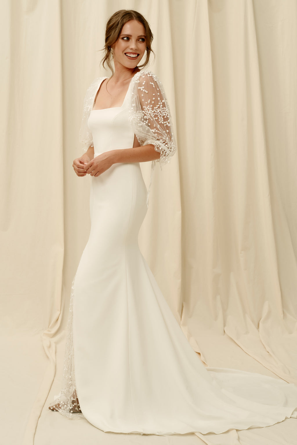 Crepe wedding dress with slit and train