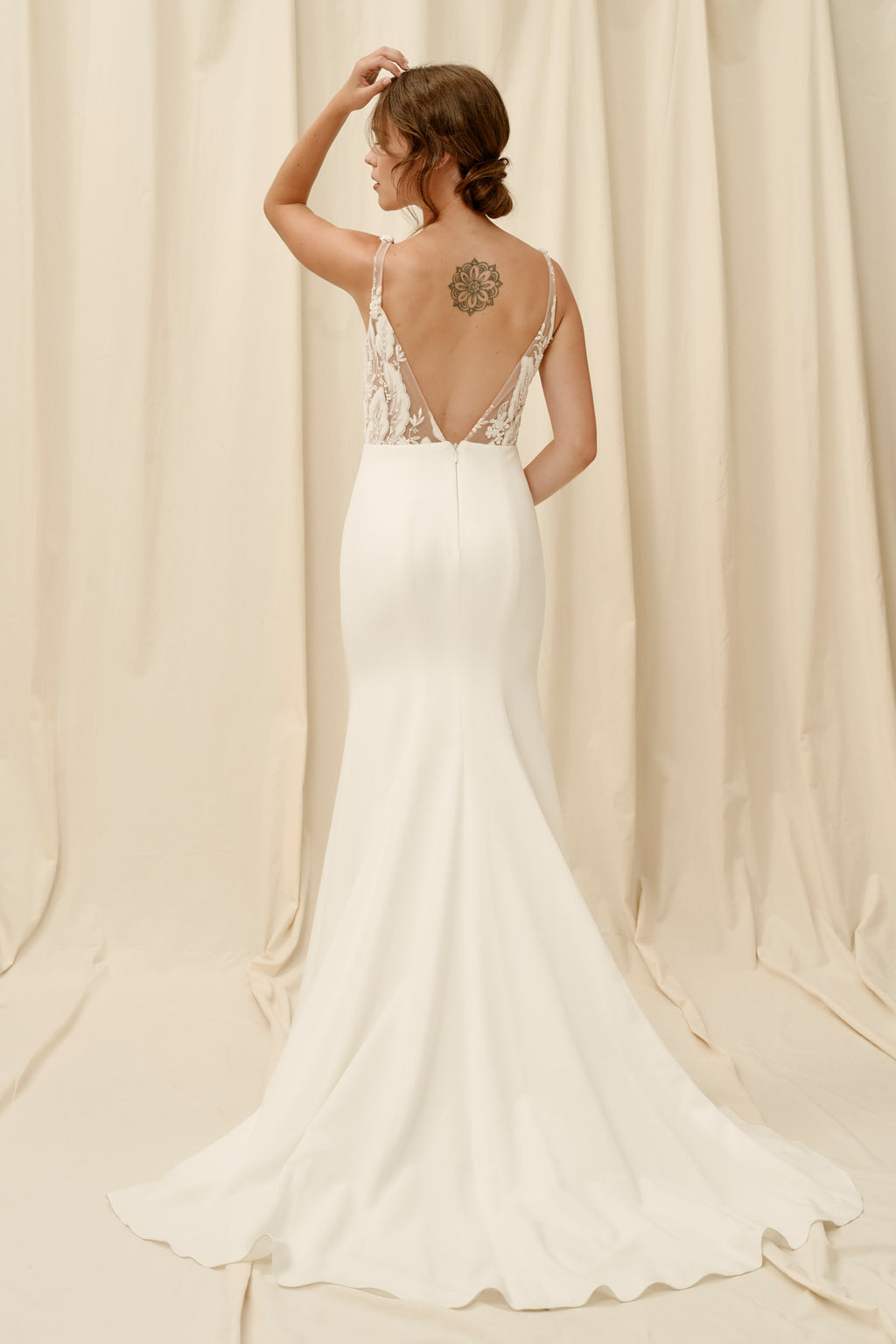 Backless mermaid wedding dress with crepe skirt and lace top