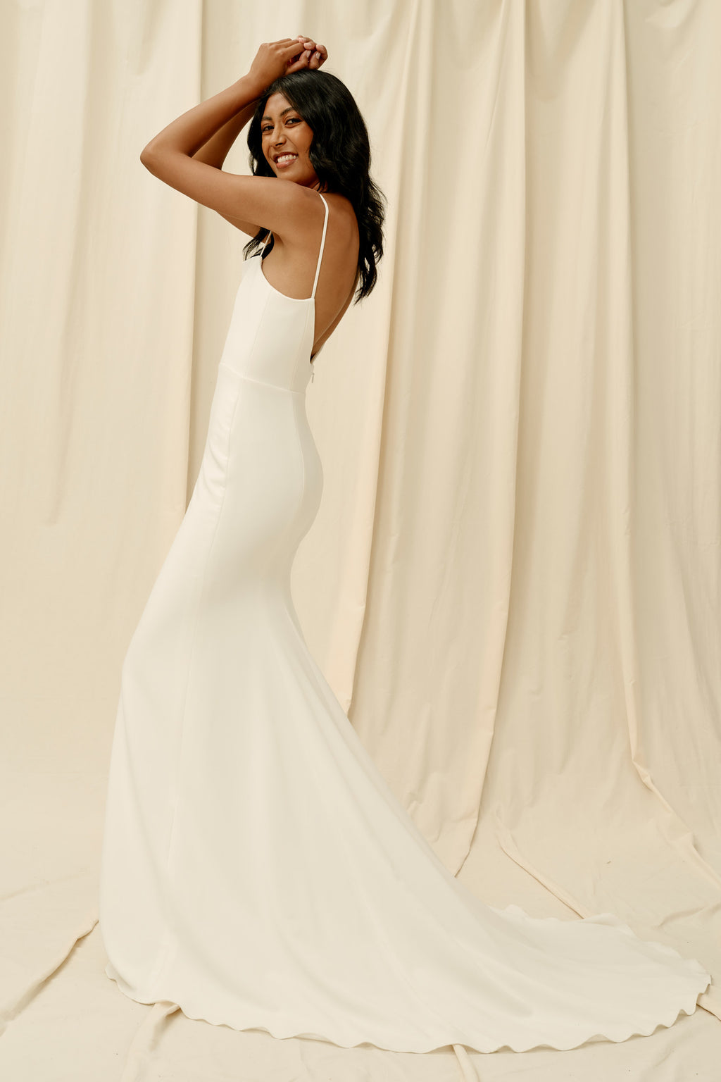Fitted low back wedding dress with spaghetti straps