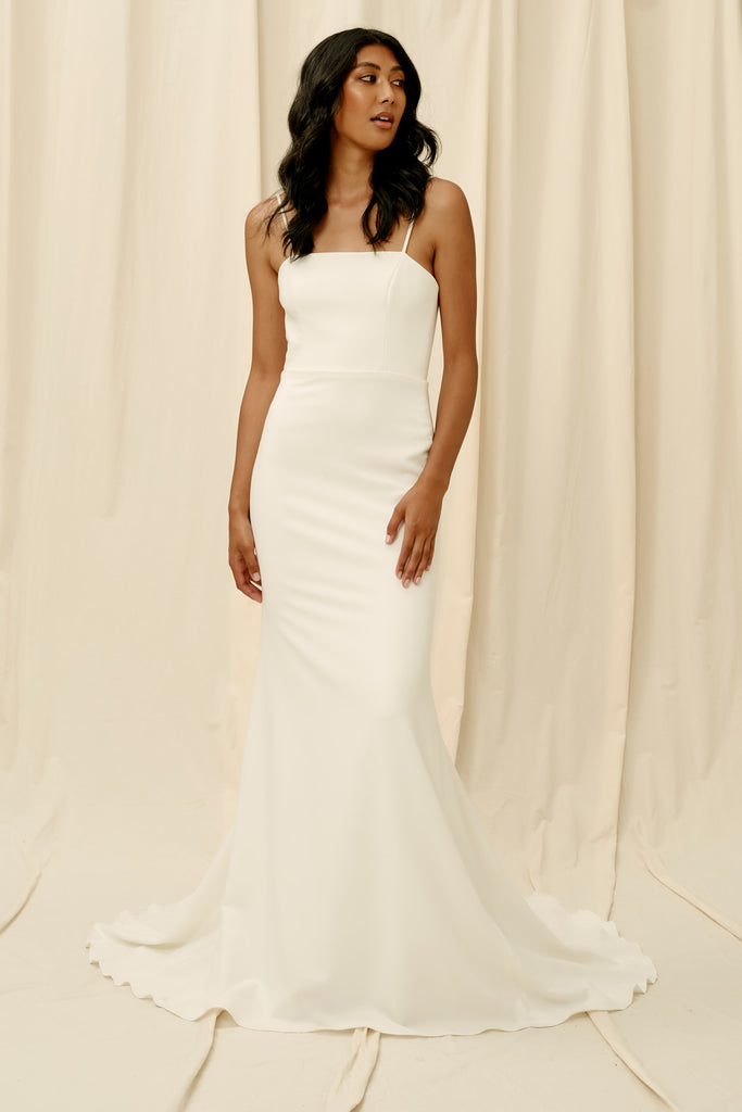 Fitted crepe wedding dress with spaghetti straps