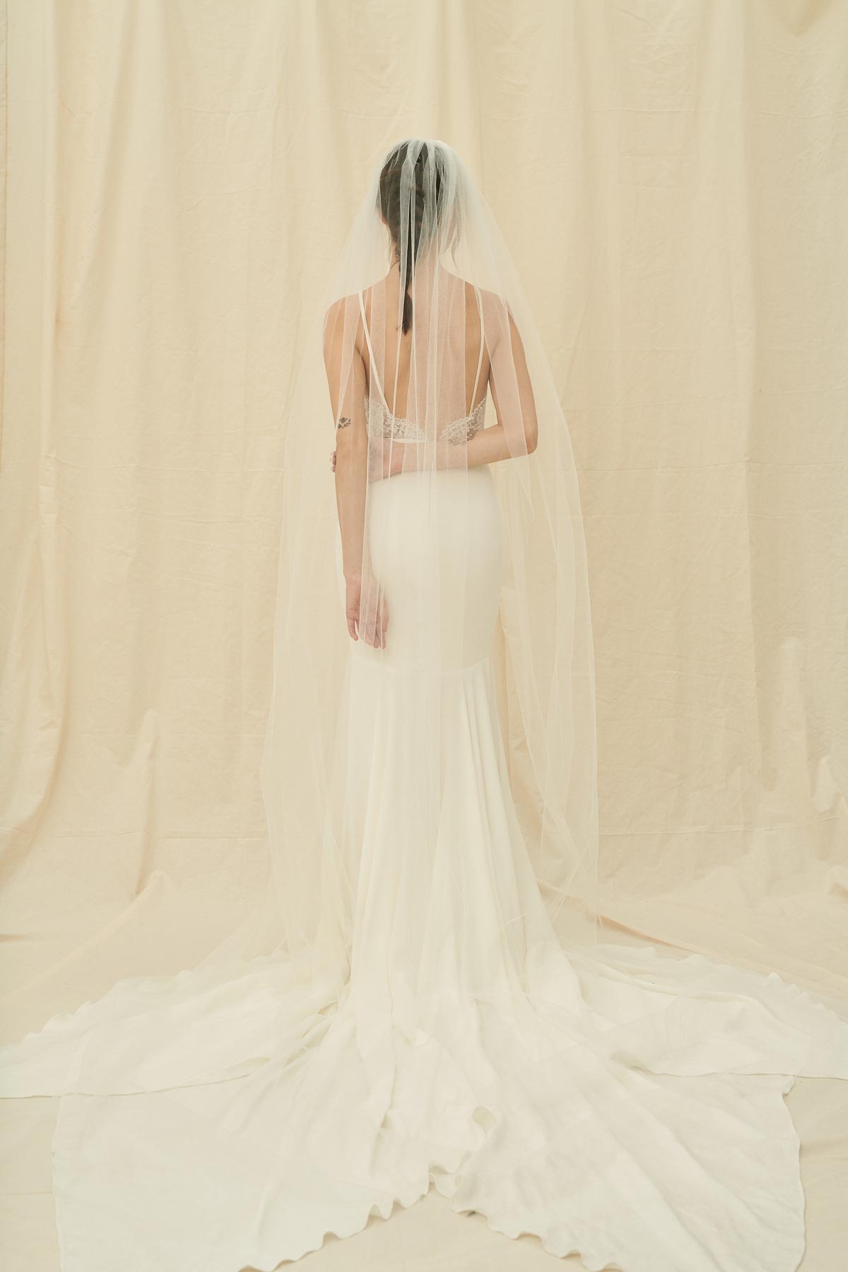 A simple, ethereal extra long bridal veil in a soft tulle