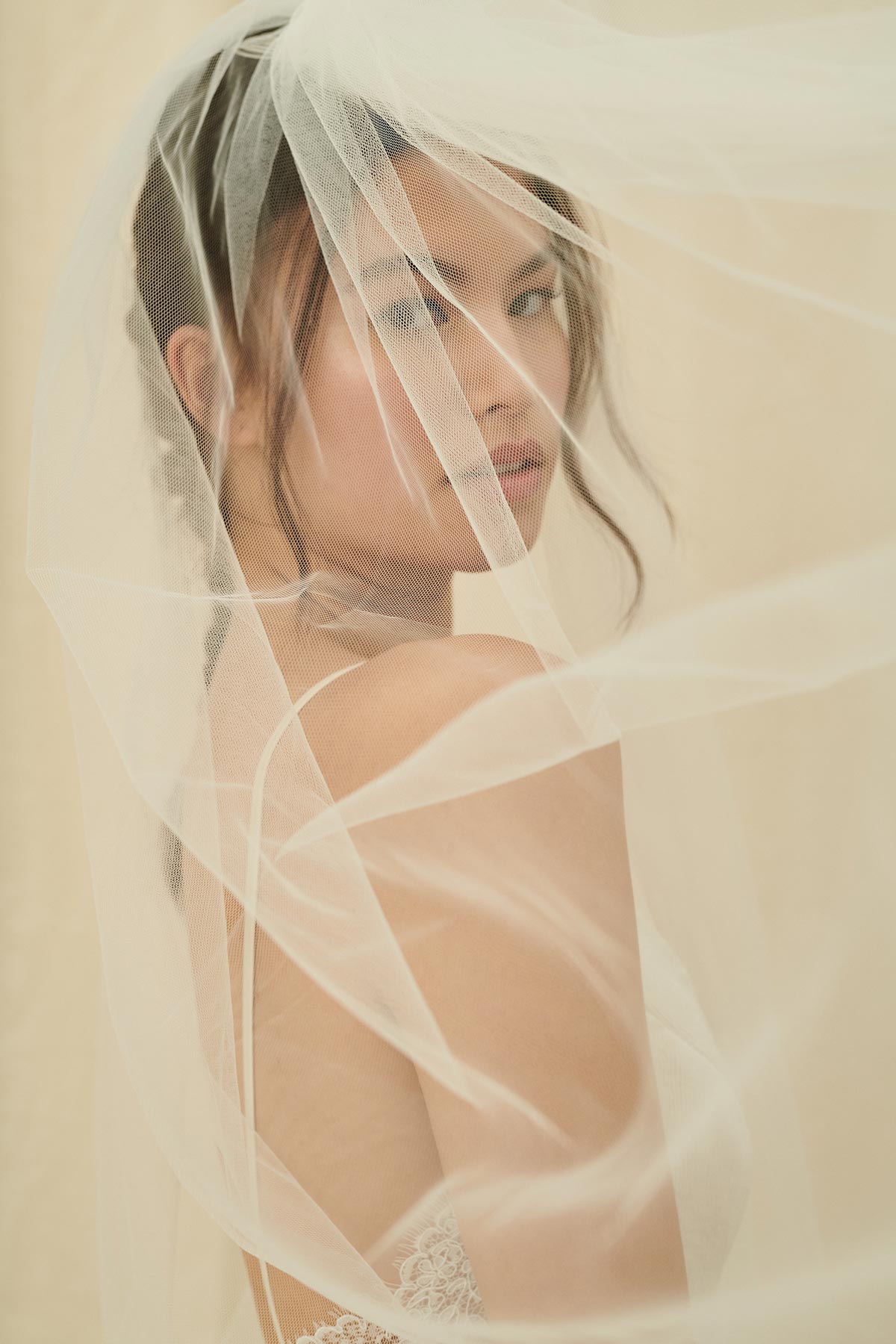 A simple, ethereal extra long bridal veil in a soft tulle