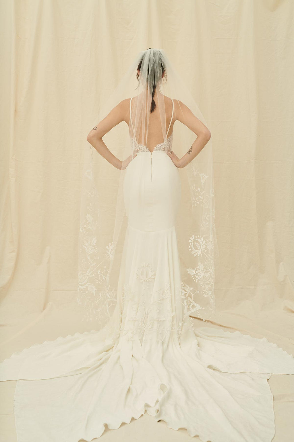 A delicate bridal veil with floral embroidery