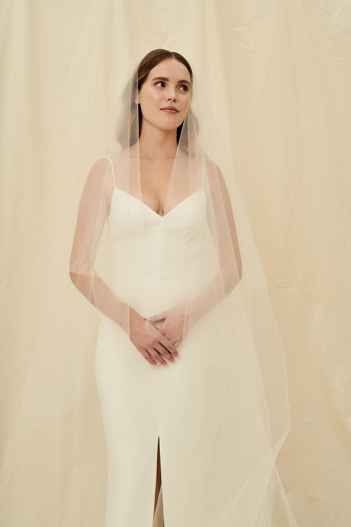 A simple veil with an extra long bottom layer and a front blusher