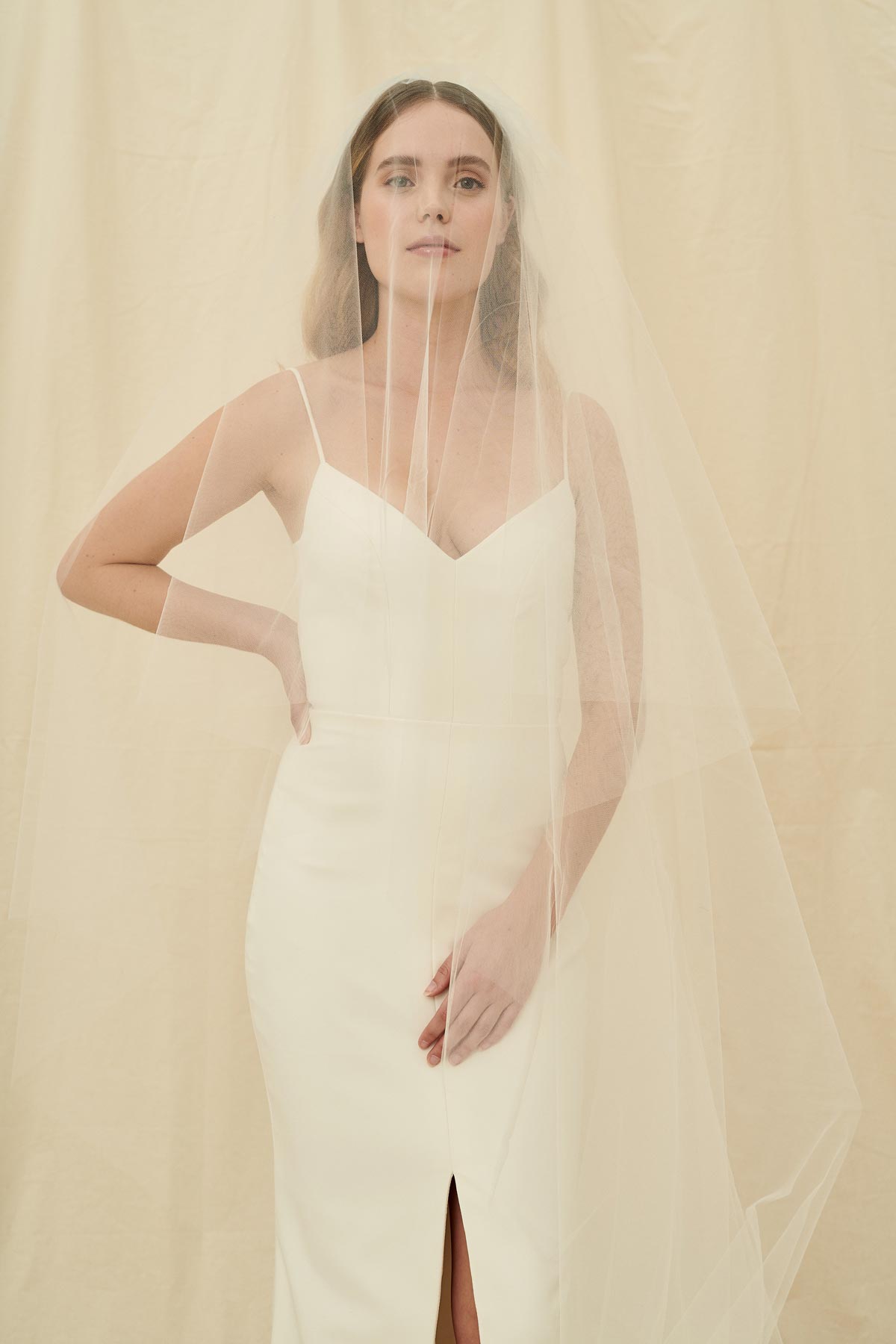 A simple veil with an extra long bottom layer and a front blusher
