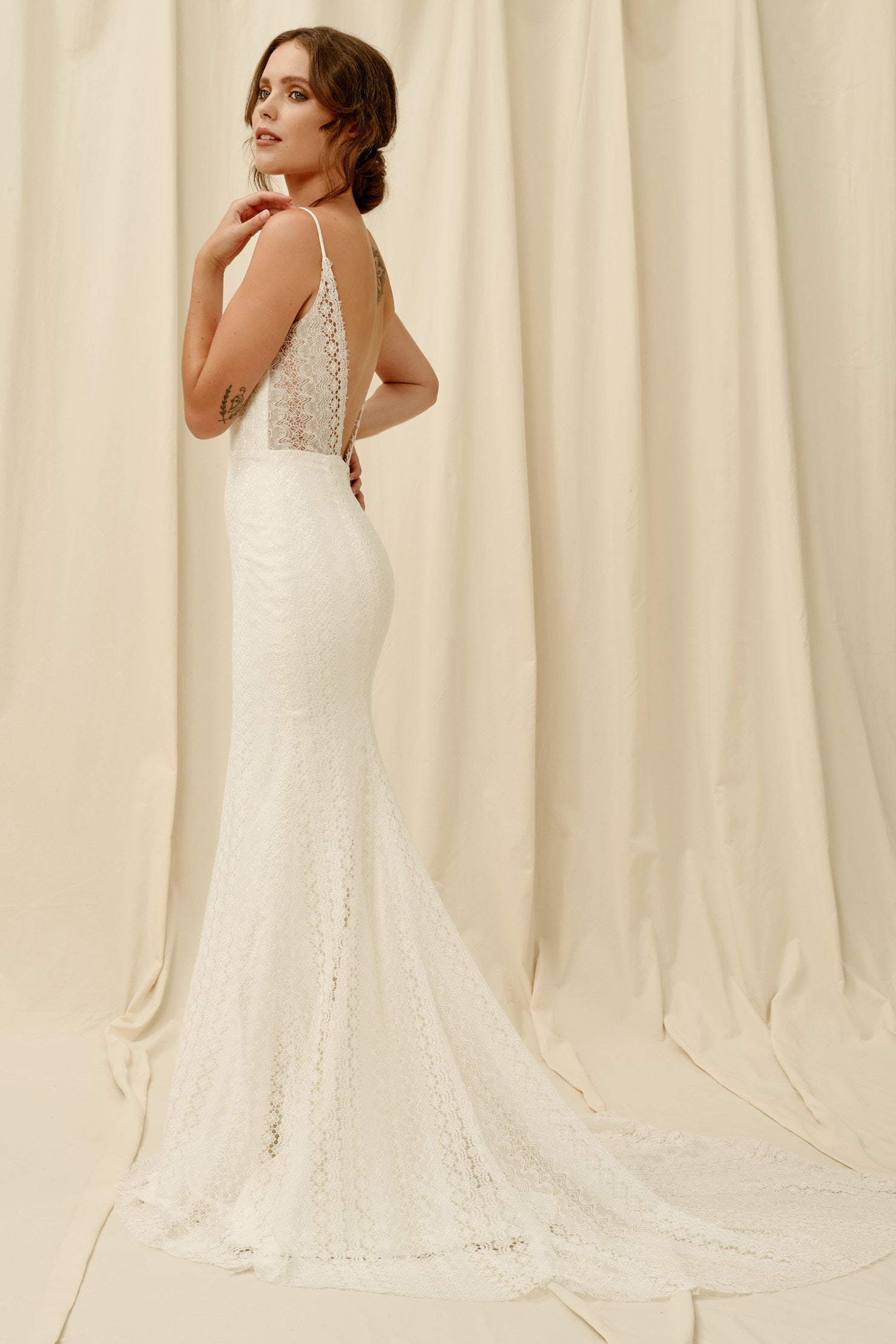 Backless mermaid wedding dress with modern lace
