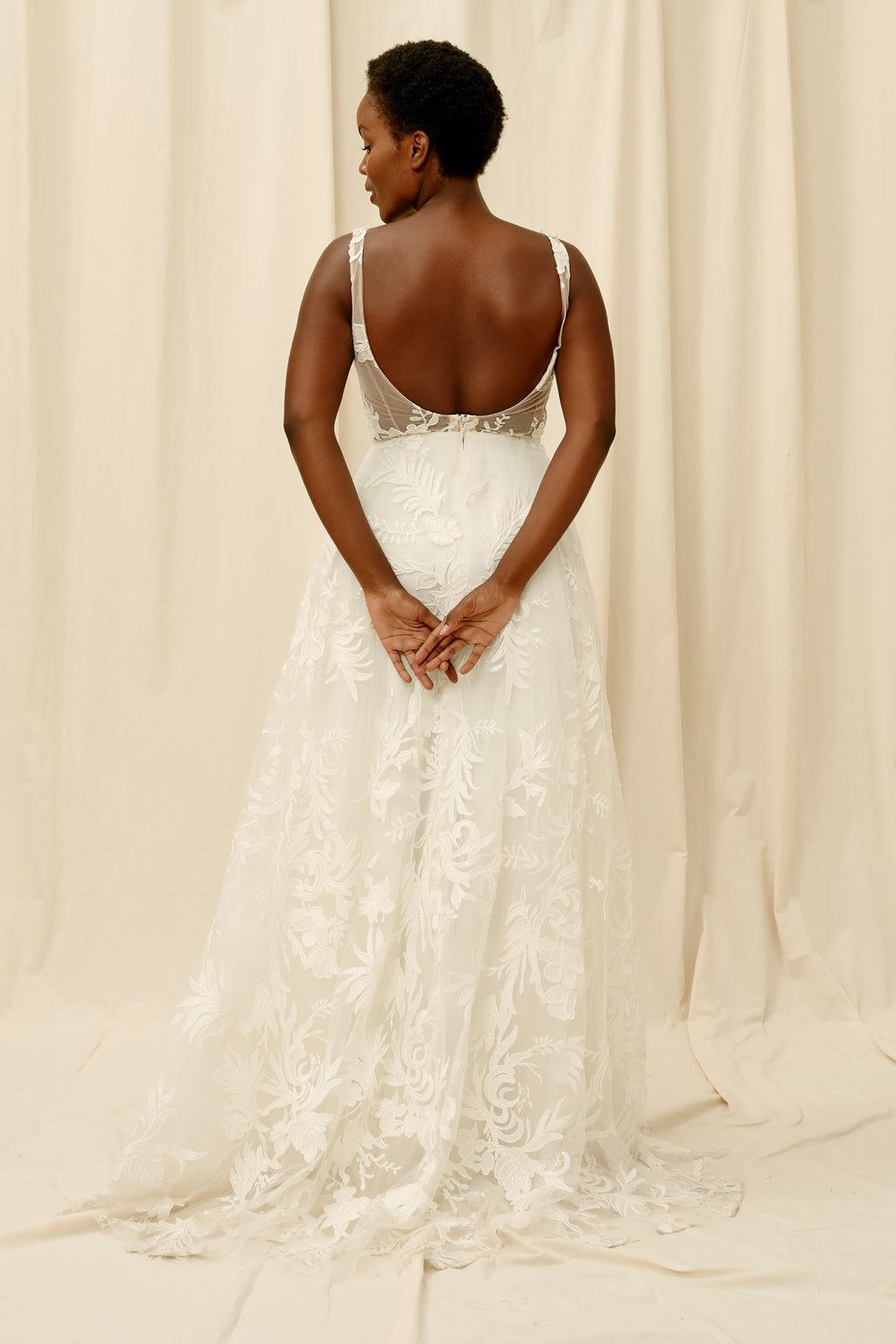 Unlined scoop back wedding dress with unique and modern floral lace
