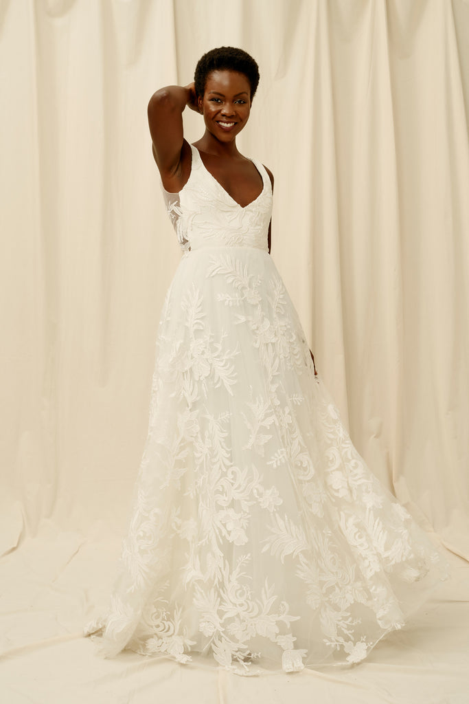 Deep v wedding dress with sequinned botanical lace