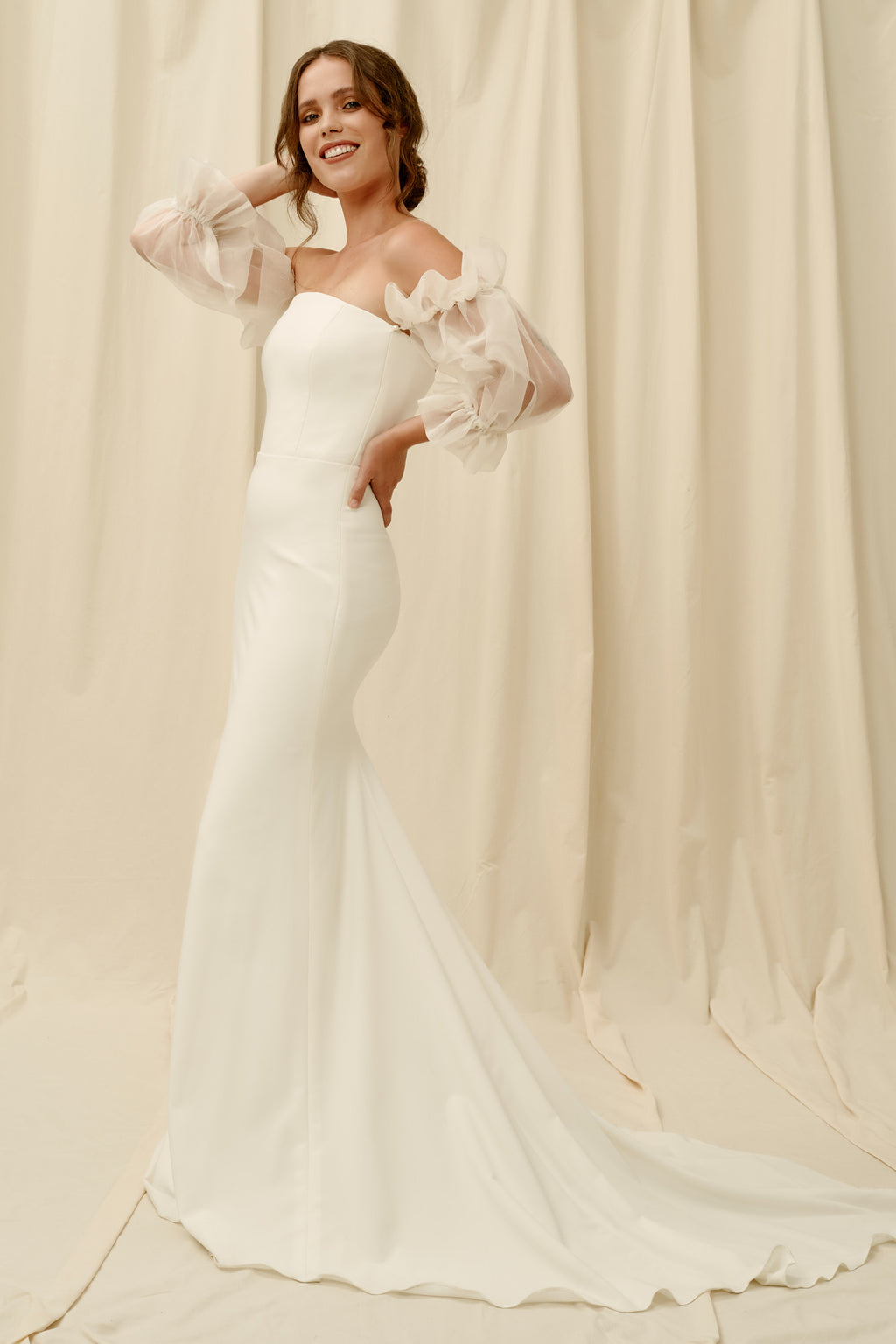 Strapless crepe wedding dress with removable puff sleeves