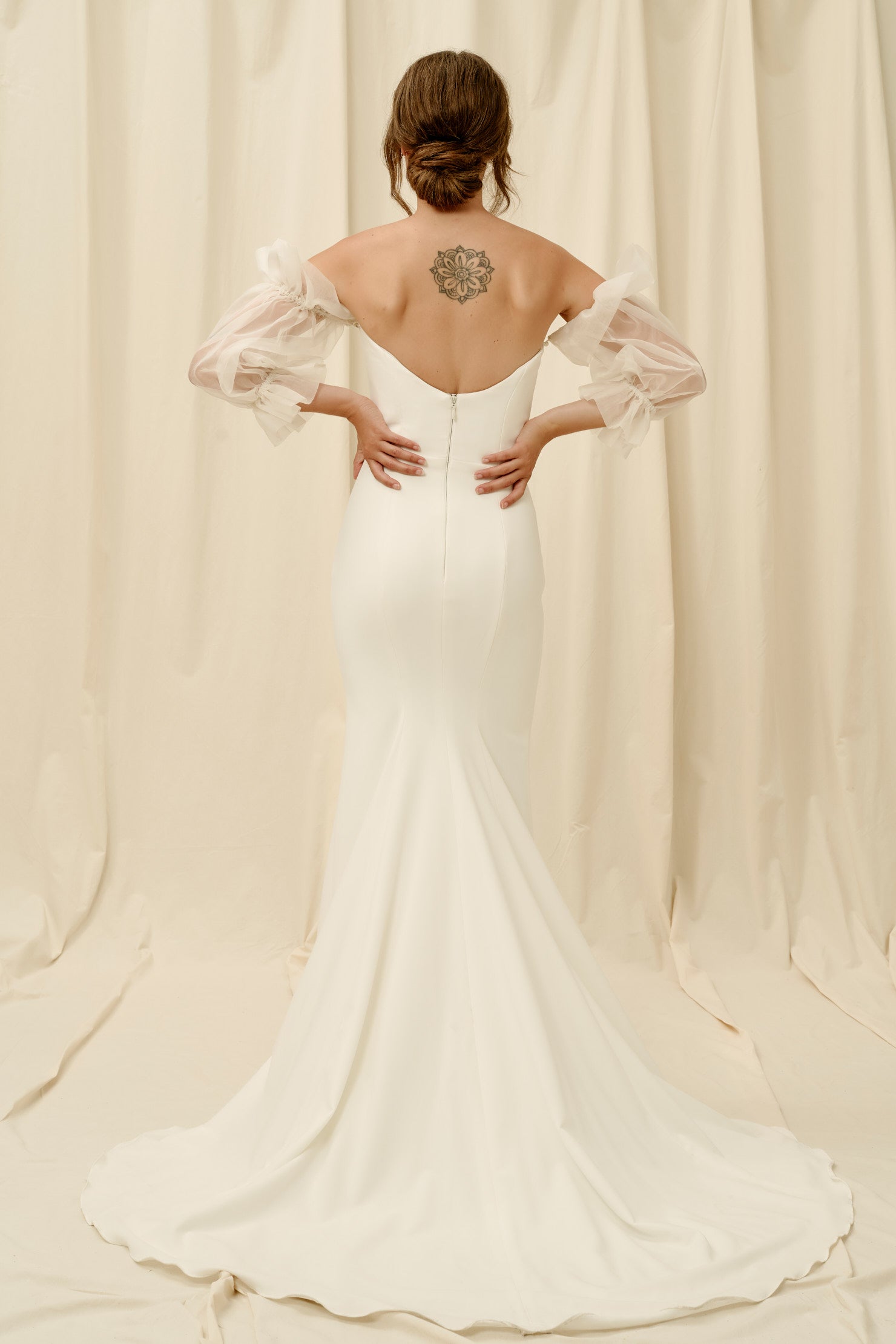 Low back crepe wedding dress with sleeves